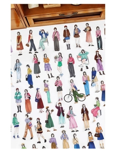 Flat lay of artistic character stickers for scrapbooking featuring fashion illustrations