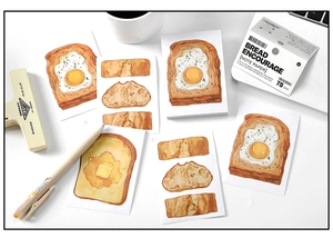 Flat lay of Bread Encourage memo pads with realistic bread illustrations and stationery