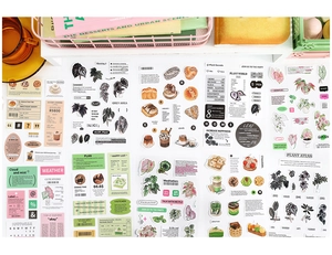 Flat lay of vintage style DIY planner stickers featuring plants and coffee shop themes