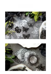 Macro detail of vintage butterfly and lace stickers for DIY scrapbooking decoration