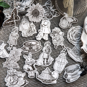 Vintage Victorian style black and white stickers with flowers and retro figures on mesh