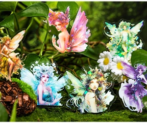 Detail of fairy theme PET stickers with iridescent laser effect on forest moss background