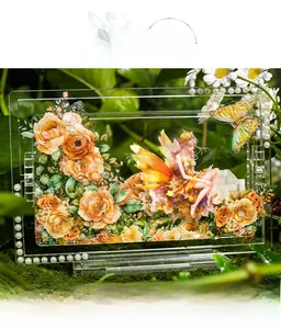 Detail of floral fairy acrylic stand with pearls and UV printing on green moss base