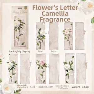 Detail of vintage camellia bookmarks with irregular torn edges on white cardstock