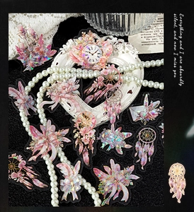 Macro detail of holographic laser PET feather stickers with vintage dreamcatcher motifs