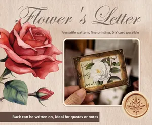 Macro detail of vintage floral bookmarks with a red rose and writeable backside