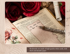 Close-up of vintage floral bookmarks made of white cardstock with a fountain pen and rose