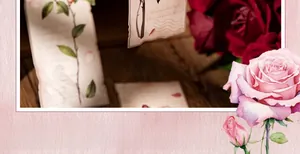 Close-up of vintage flower bookmarks with rose patterns and irregular edges on wood