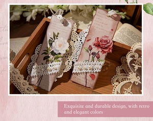 Macro detail of vintage floral bookmarks with elegant lace trim and pearl accents