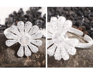 Detailed macro shot of S925 sterling silver hallmark inside the daisy zircon ring band