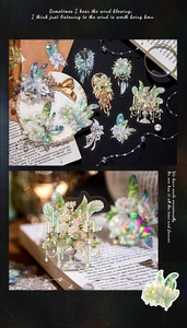 Macro detail of PET crystal stickers showing iridescent floral and chandelier designs