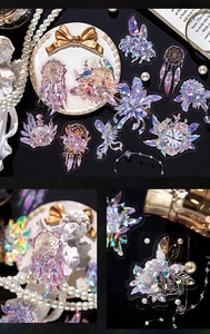 Detail of vintage PET stickers with iridescent laser gold edges and feather patterns