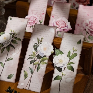 Vintage irregular floral bookmarks featuring white camellia and rose motifs with script