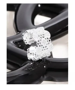 Detailed close-up of S925 sterling silver honeycomb lattice ring with hollow out pattern