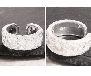 Close-up of S925 sterling silver stamp on vintage woven texture lace open ring