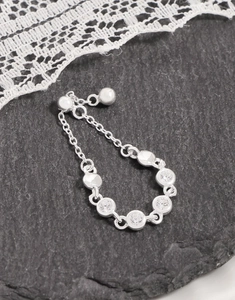 Detailed view of adjustable S925 sterling silver chain ring with sparkling zircons