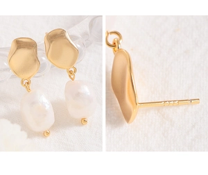 Detail of S925 sterling silver earring with baroque pearl and matte gold petal texture