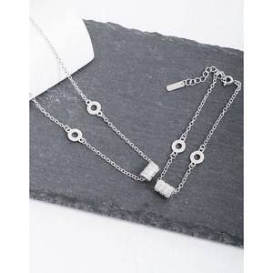 Minimalist S925 sterling silver jewelry set featuring cylinder zircon charms on fine chain