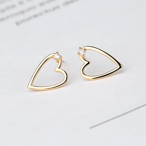Elegant 925 sterling silver hollow heart earrings with sparkling zircon gemstones