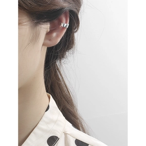 Minimalist S925 sterling silver U-shaped ear cuff shown on a model for everyday fashion