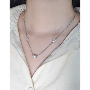 S925 sterling silver necklace with cylindrical zircon pendant on model