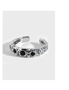 Detail of S925 sterling silver stamp and black stone inlay on the textured ring