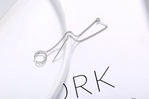 Detailed view of S925 sterling silver long chain earring with moon-shaped ear cuff