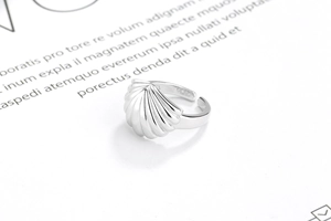 Detailed macro shot of S925 sterling silver shell ring showing the inner quality hallmark
