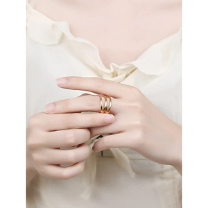 Elegant gold multi-layer wrap ring in minimalist S925 silver design worn by model