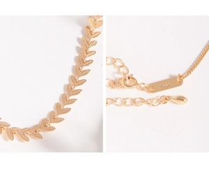 Macro view of gold leaf choker chain with S925 hallmark and adjustable extender chain