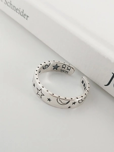Detailed close-up showing the S925 silver stamp inside the vintage star and moon ring