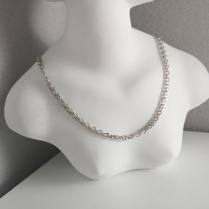 Detail of S925 sterling silver double layered necklace on mannequin with O-chain style