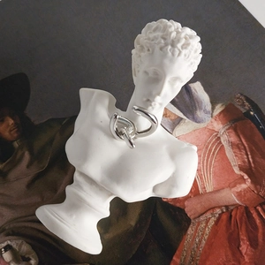 Elegant S925 sterling silver chain link ear cuffs displayed on a classical white plaster bust
