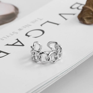 Detailed view of an S925 sterling silver hollow chain ring on a white magazine background