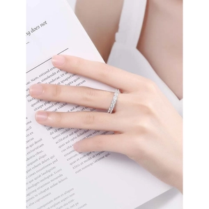 Minimalist S925 sterling silver eternity ring with sparkling zircon stones on a model hand