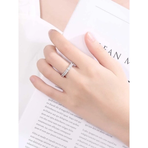 Minimalist S925 sterling silver gear ring with zircon pave, shown on model hand