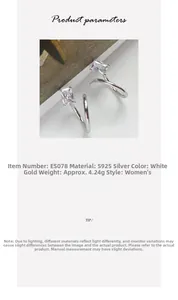 Close-up of S925 sterling silver spiral earring with rectangular zircon, weight 4.24g