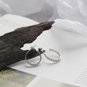 Minimalist S925 sterling silver hoop earrings with a unique scalloped wavy edge design