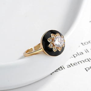 Gold adjustable S925 silver ring featuring black enamel sunflower and sparkling zircon