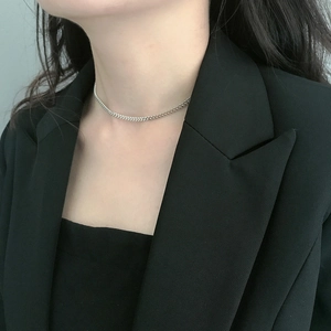 Minimalist 925 sterling silver curb chain choker necklace worn by a female model