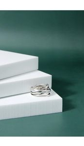 Macro detail of multi-layered S925 sterling silver ring showing the internal hallmark