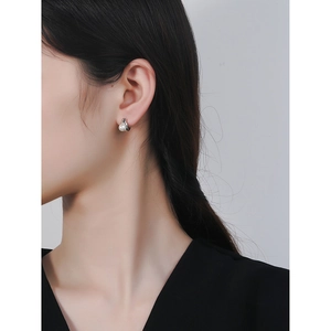 Elegant S925 sterling silver pearl hoop earrings in a minimalist French style on a model
