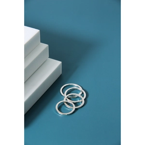 Set of four minimalist 925 sterling silver rings with high-polish mirror finish
