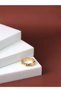 Detail of S925 sterling silver stamp on the inner band of the gold bamboo-style ring