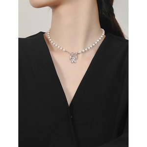 Elegant S925 sterling silver pearl necklace with butterfly pendant and T-bar closure
