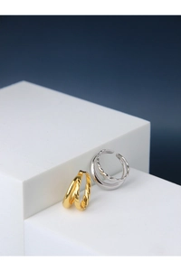 Detail of minimalist S925 sterling silver double-layered twisted and smooth rings