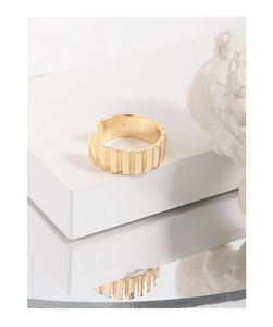 Macro detail of gold plated S925 sterling silver ring with vertical ribbed texture