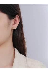 Minimalist gold hoop earring shown on Asian model for a classic professional style