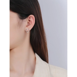 Chic minimalist S925 sterling silver irregular hoop earrings shown on model