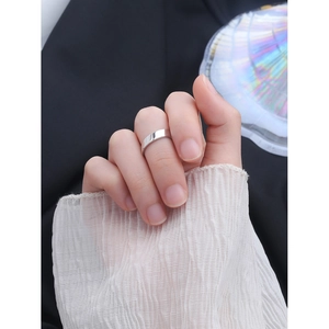 S925 sterling silver minimalist slanted wide band ring shown on a hand